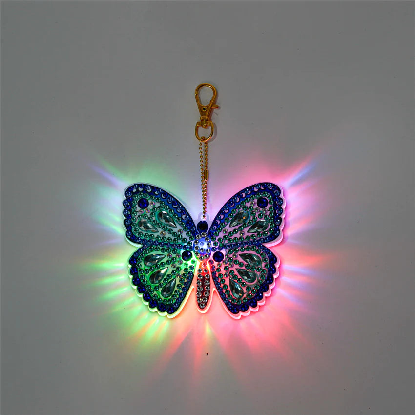 GLOEIENDE SLEUTELHANGER | VLINDER